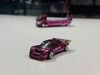 XE MÔ HÌNH HEC 2026 - SET 2PSC PANDEM LOTUS ELISE X PANDEM FUSO-300 PINK CHROME,TỶ LỆ 1/64 POP RACE