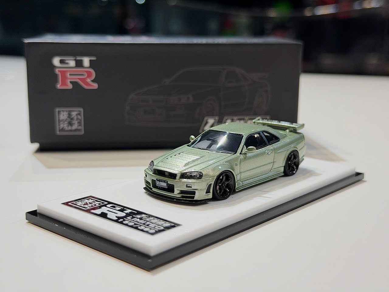 XE MÔ HÌNH NISSAN GT-R R34 SKYLINE NISMO Z-TUNE GREEN,TỶ LỆ 1/64 SACRILEGIOUS AUTO MODEL