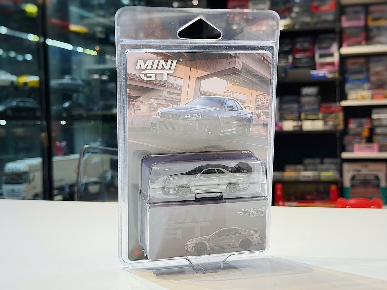 XE MÔ HÌNH NISSAN SKYLINE GT-R R34 NISMO GREY,TỶ LỆ 1/64 MINIGT