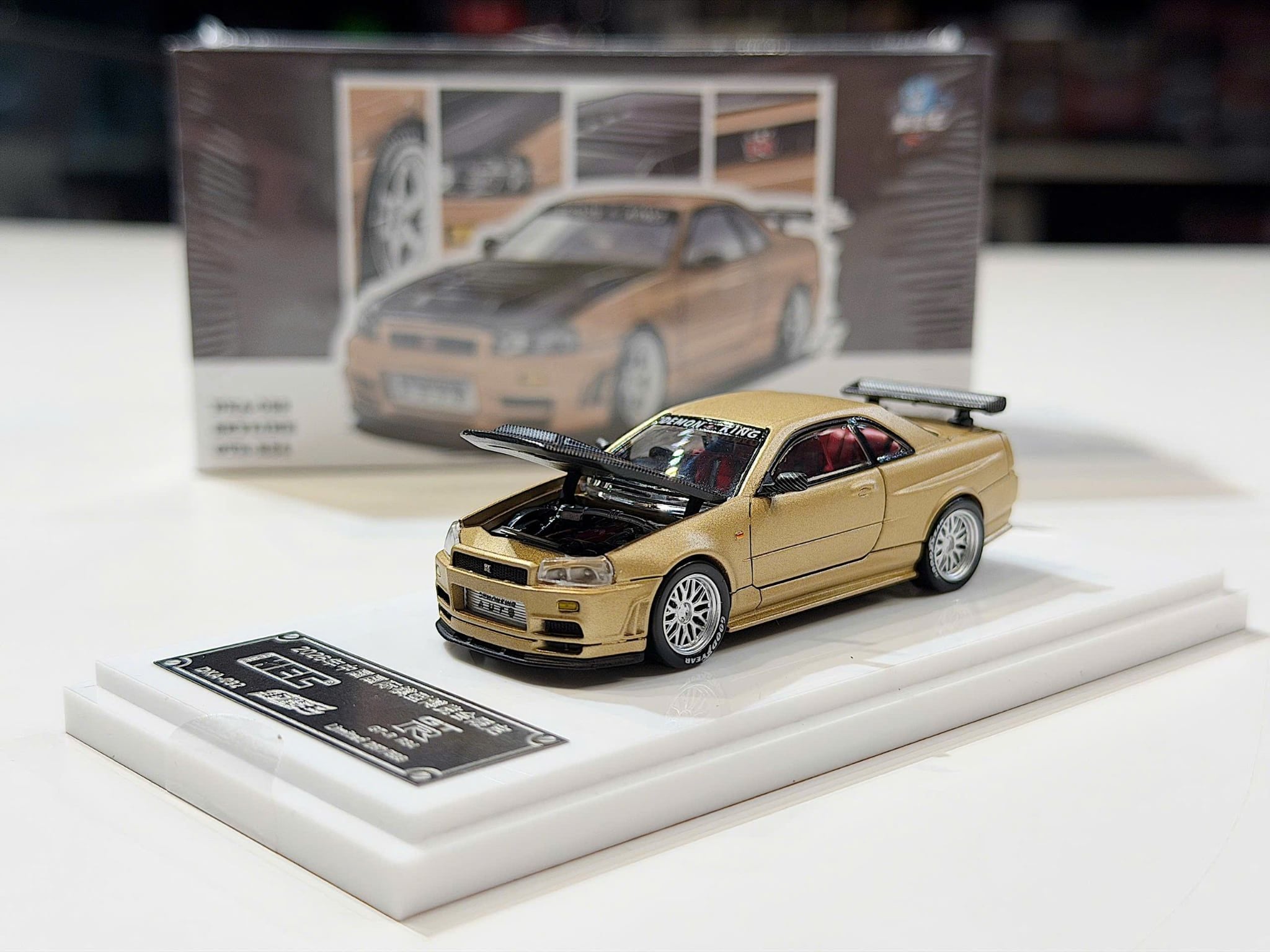 XE MÔ HÌNH HEC - NISSAN GT-R R34 SKYLINE GOLD,TỶ LỆ 1/64 DEMON KING