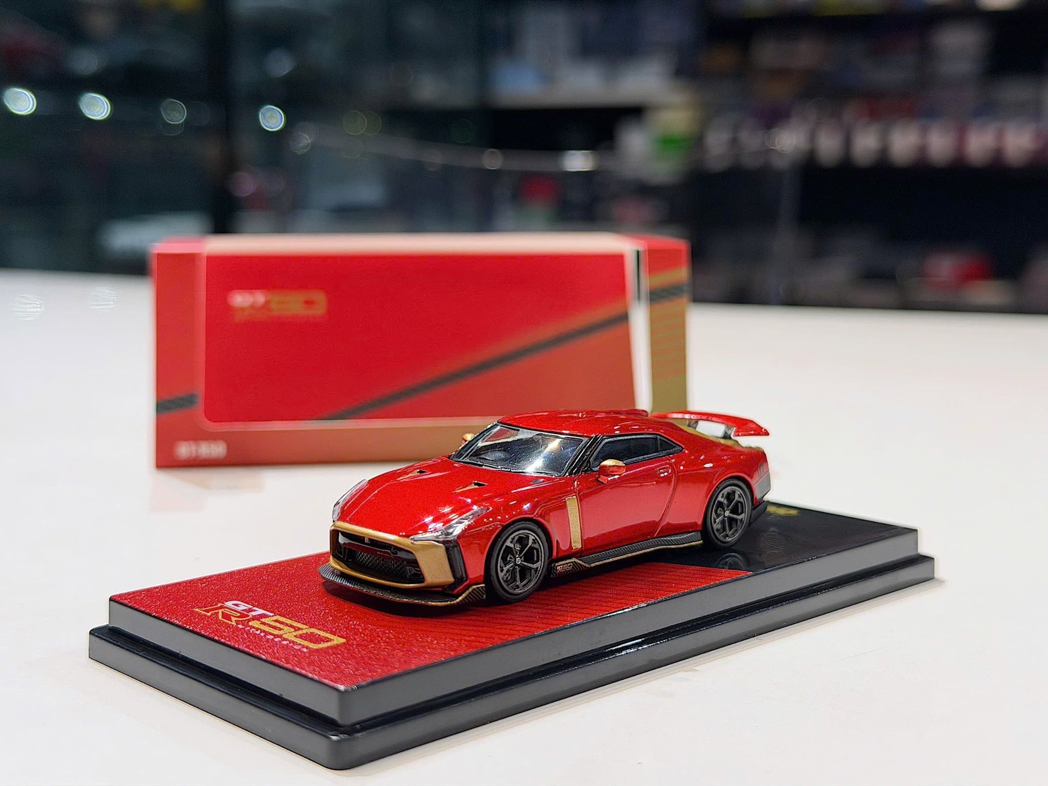 XE MÔ HÌNH NISSAN GT-R50 RED,TỶ LỆ 1/64 INNO