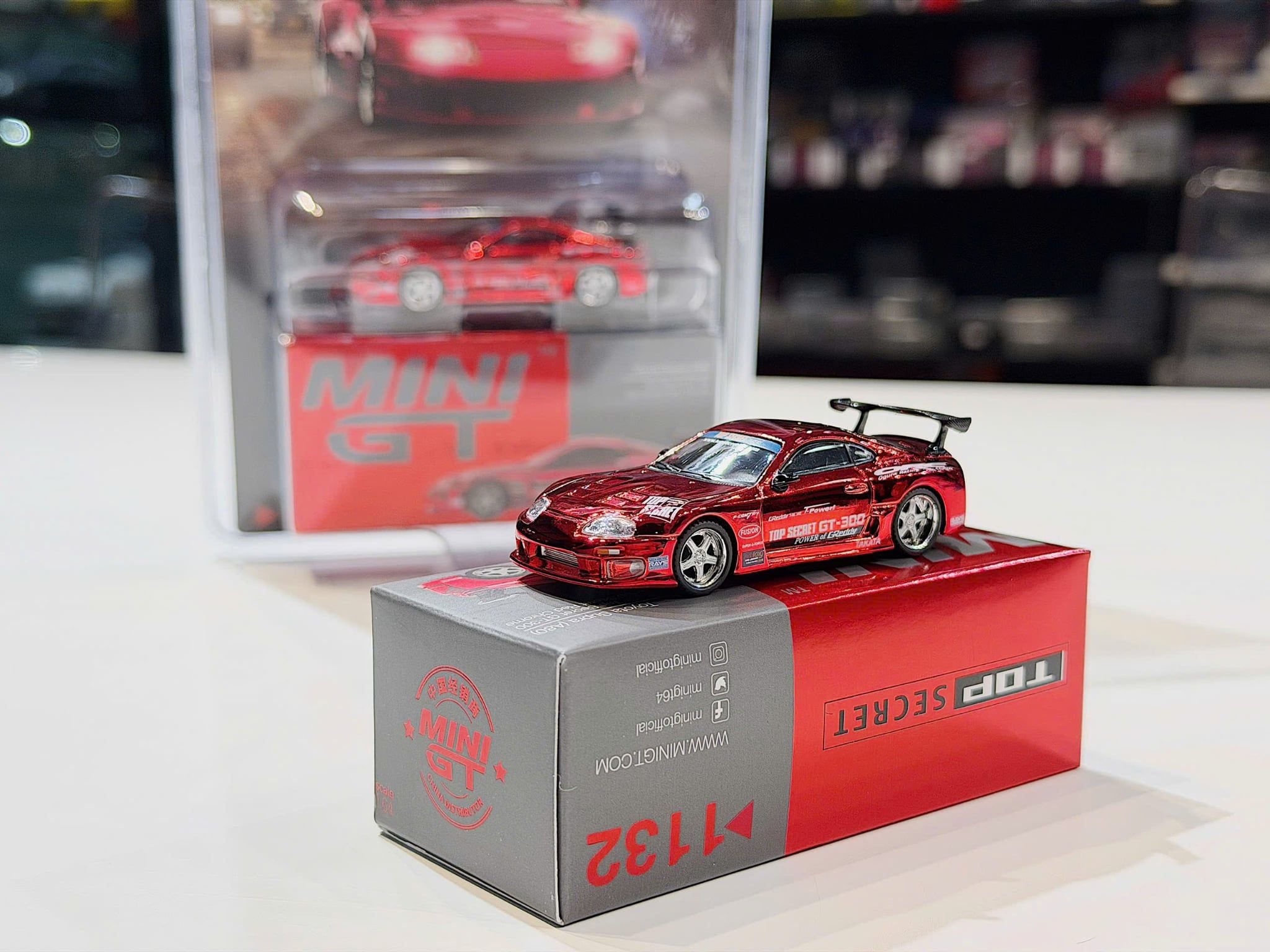 XE MÔ HÌNH  TOYOTA SUPRA A80 TOP SECRET GT-300 RED CHROME,TỶ LỆ 1/64 MINIGT