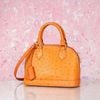 Túi đeo Louis Vuitton Alma BB Mandarin Ostrich