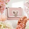 Túi Louis Vuitton Twist Whipstitch Heart MM Rose Ballerine