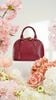 Túi đeo Louis Vuitton Alma BB Prune Ostrich