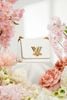 Túi đeo Louis Vuitton Twist PM Bronze White