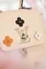 Balo/ Túi đeo Louis Vuitton Creme Calfskin Mechanical Flower Lockme Mini