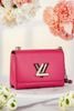 Túi Louis Vuitton Pink Epi Twist MM