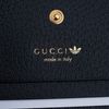 Túi đeo Gucci x Adidas Mini Wallet Goaskin (Đen Trắng)