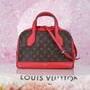 Túi đeo Louis Vuitton Dora MM Monogram Ebene / Red Calfskin