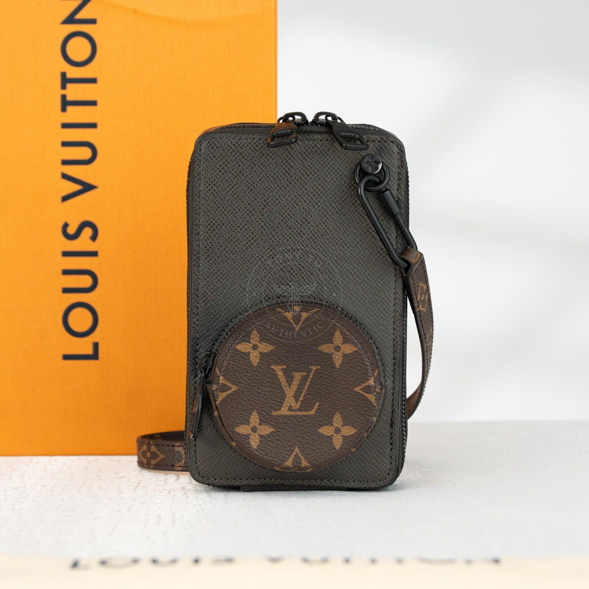 Túi đeo Louis Vuitton Phone Box Monogram Ebene Brown Taiga