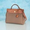 Túi Hermes Herbag PM Etoupe Vache Hunter/Canvas size 31