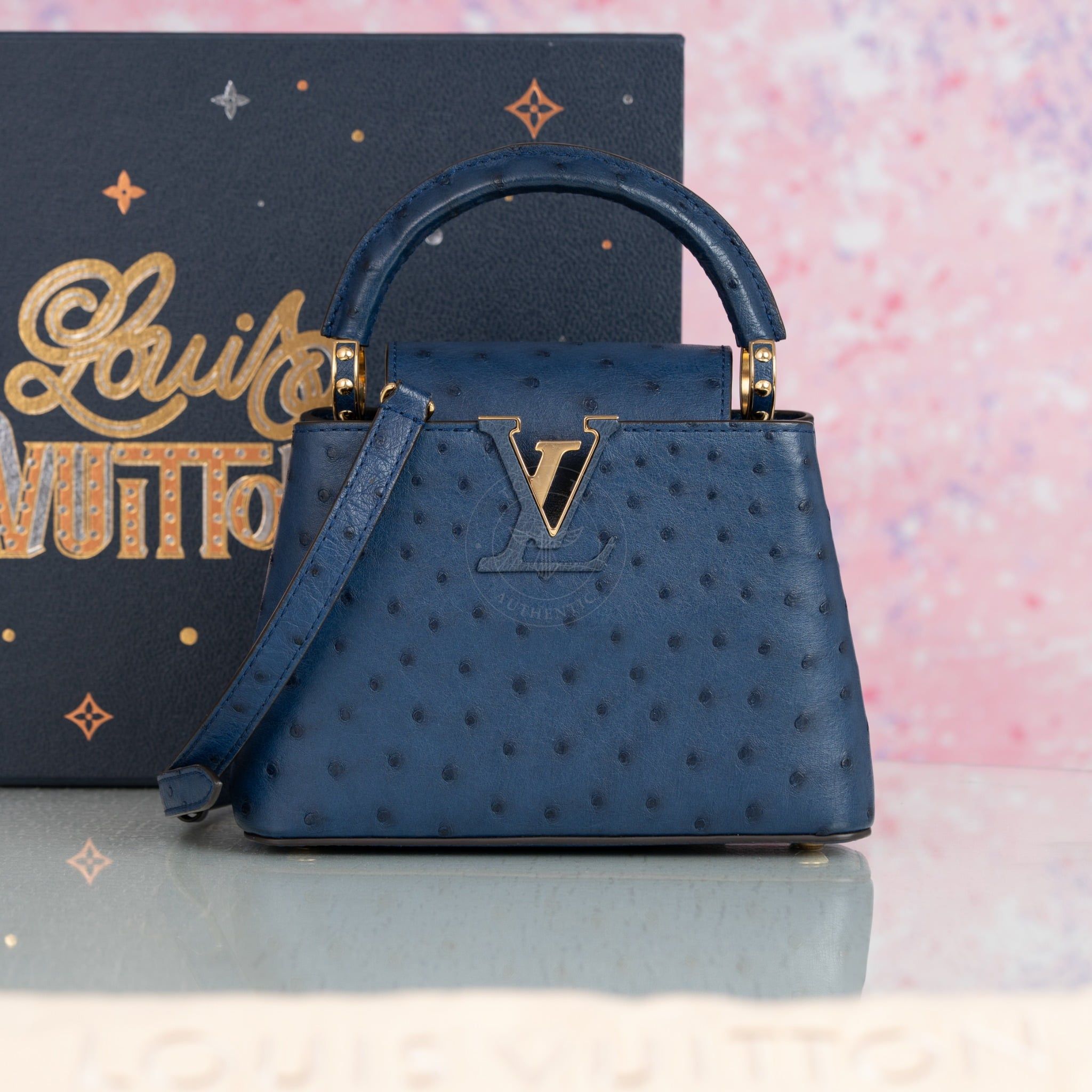 Túi đeo Louis Vuitton Capucines Mini Navy Ostrich size 21