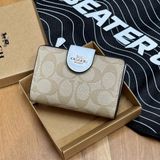 849 - Ví Coach Medium Corner Zip Wallet In Signature Canvas White Khaki - C0082