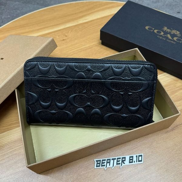 869 - Ví Coach Cầm Tay Dáng Dài khóa Zip Embossed Signature Black Leather - F58113