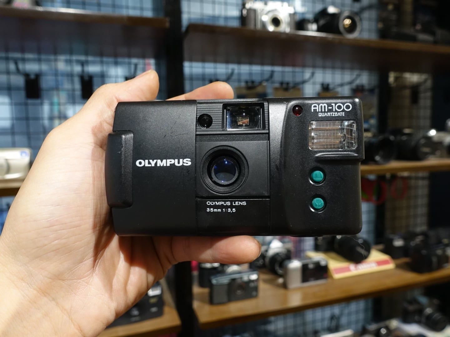  Olympus AM-100 