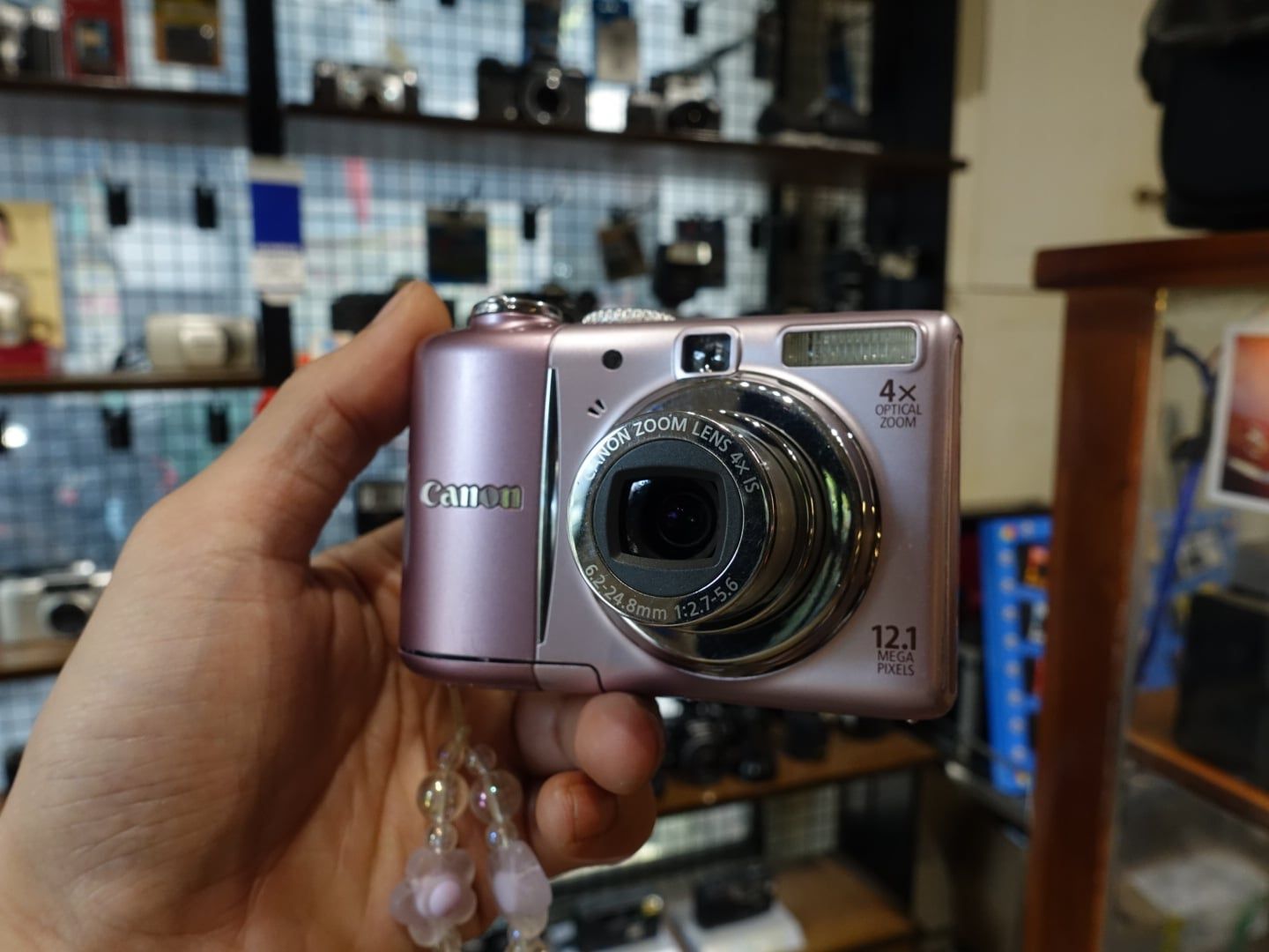  Canon A1100IS  pink color. 
