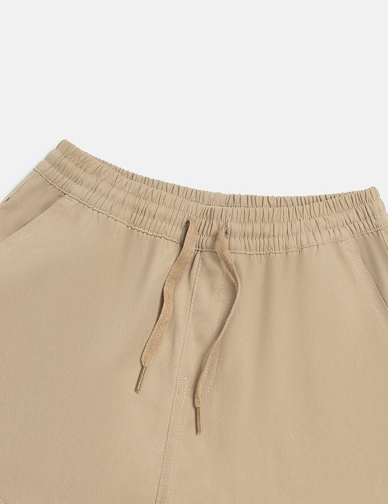 Quần khaki gấu bo bé trai hình in thân trước