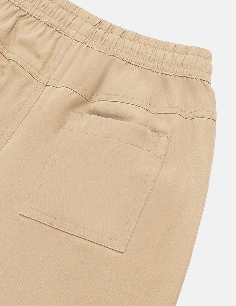 Quần khaki bé trai cạp chun mác in trang trí