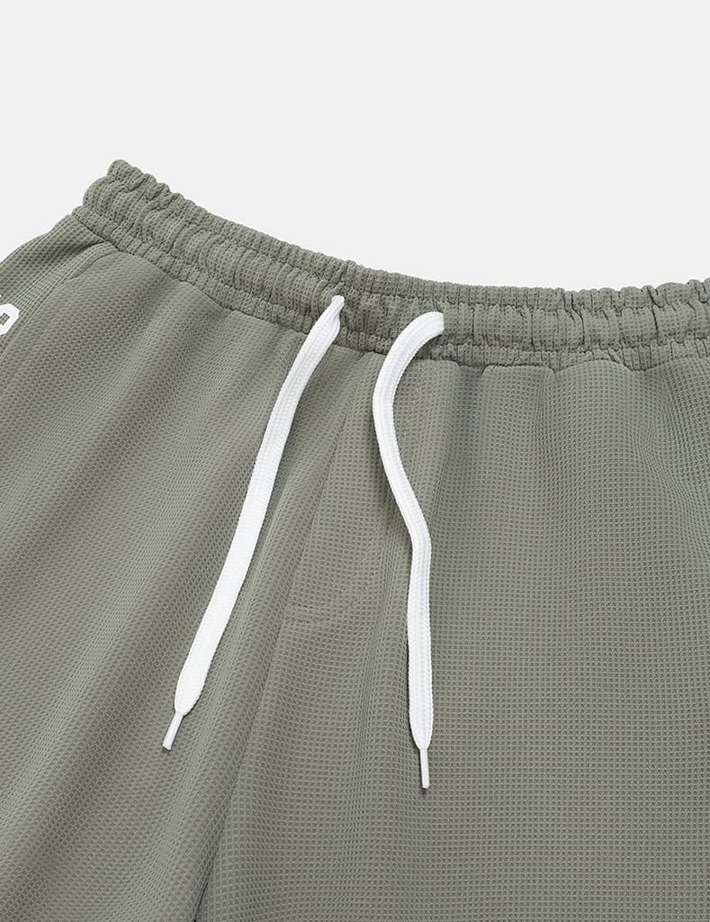 Quần short dệt kim bé trai