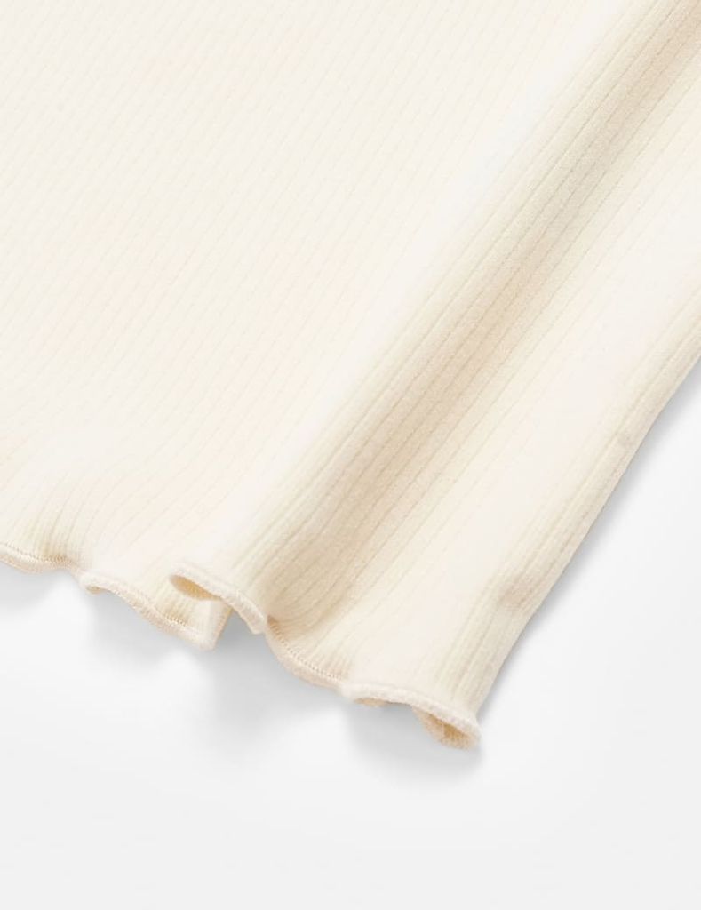 Áo giữ nhiệt bé gái cổ cao hình thêu thân trước