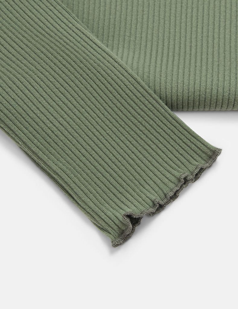 Áo giữ nhiệt cổ cao bé gái hình thêu trước ngực