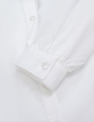 Áo sơ mi bé gái dài tay