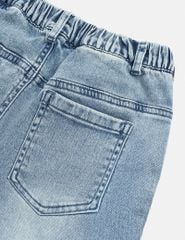 Quần jean ống loe bé gái đính nơ gần gấu quần