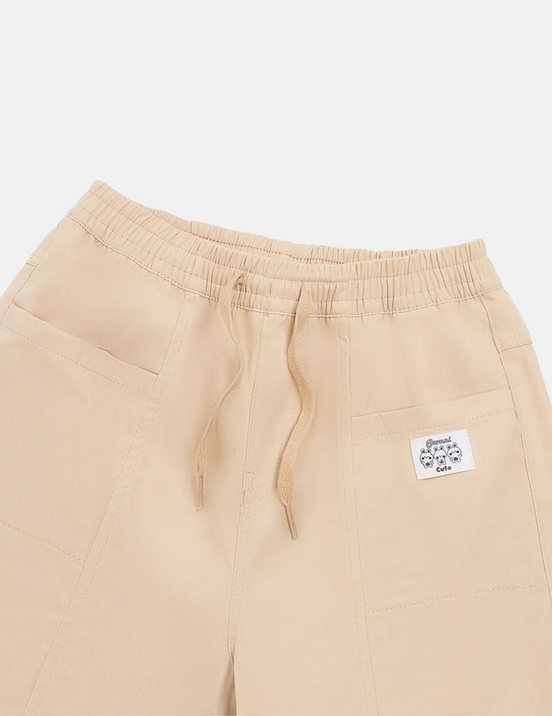 Quần khaki bé gái cạp chun bo gấu gắn mác trang trí