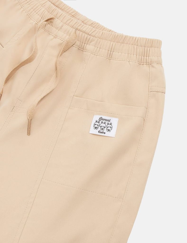 Quần khaki bé gái cạp chun bo gấu gắn mác trang trí