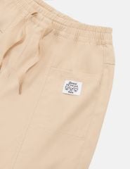 Quần khaki bé gái cạp chun bo gấu gắn mác trang trí