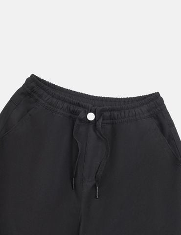 Quần khaki bé gái cạp chun mác dệt thân trước