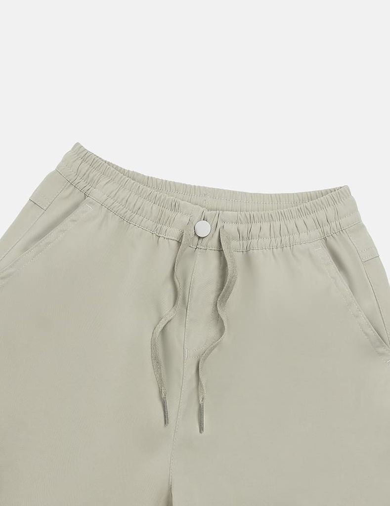 Quần khaki bé gái cạp chun mác dệt thân trước