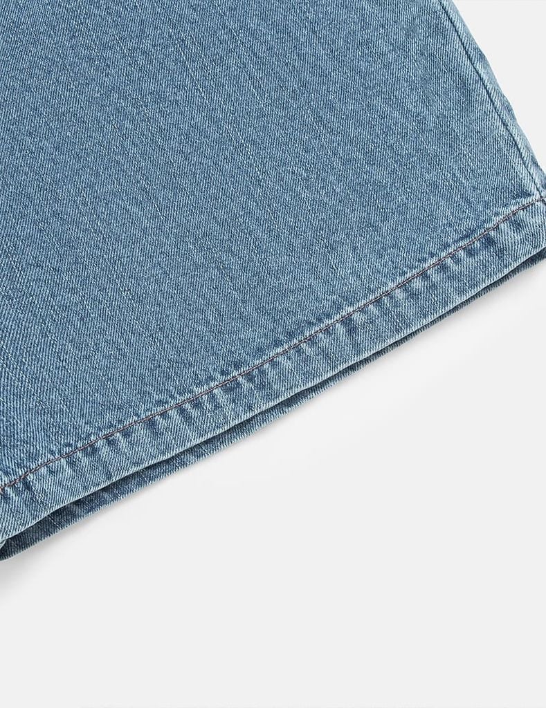 Quần short jean bé gái cạp chun vạt lệch