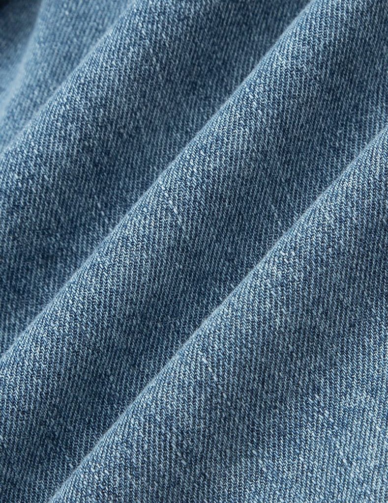 Quần short jean bé gái cạp chun vạt lệch