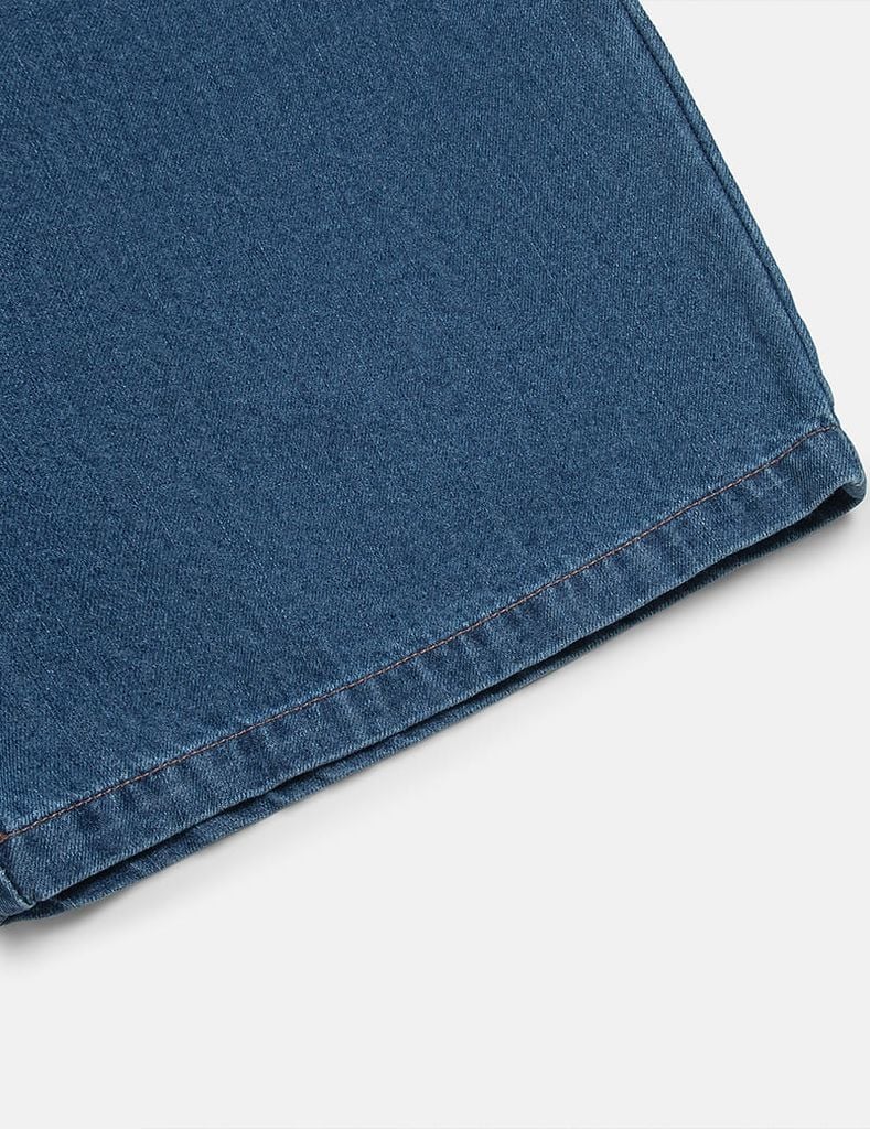 Quần short jean bé gái cạp chun vạt lệch