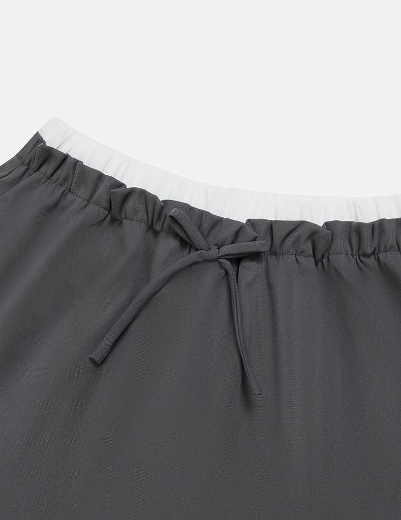 Chân váy khaki bé gái cạp chun rời vải phối
