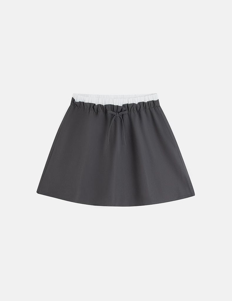 Chân váy khaki bé gái cạp chun rời vải phối
