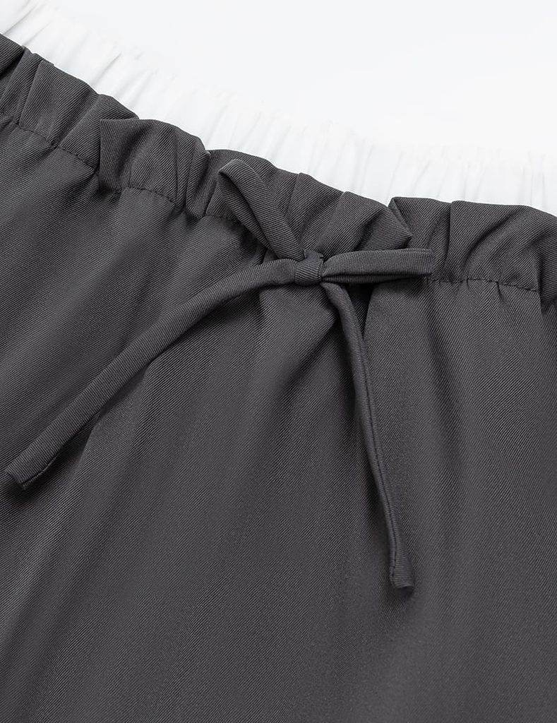 Chân váy khaki bé gái cạp chun rời vải phối