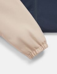 Áo gió có mũ trẻ em phối tay thân in logo trước ngực