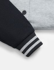 Áo khoác bomber trẻ em phối tay hình in trước ngực