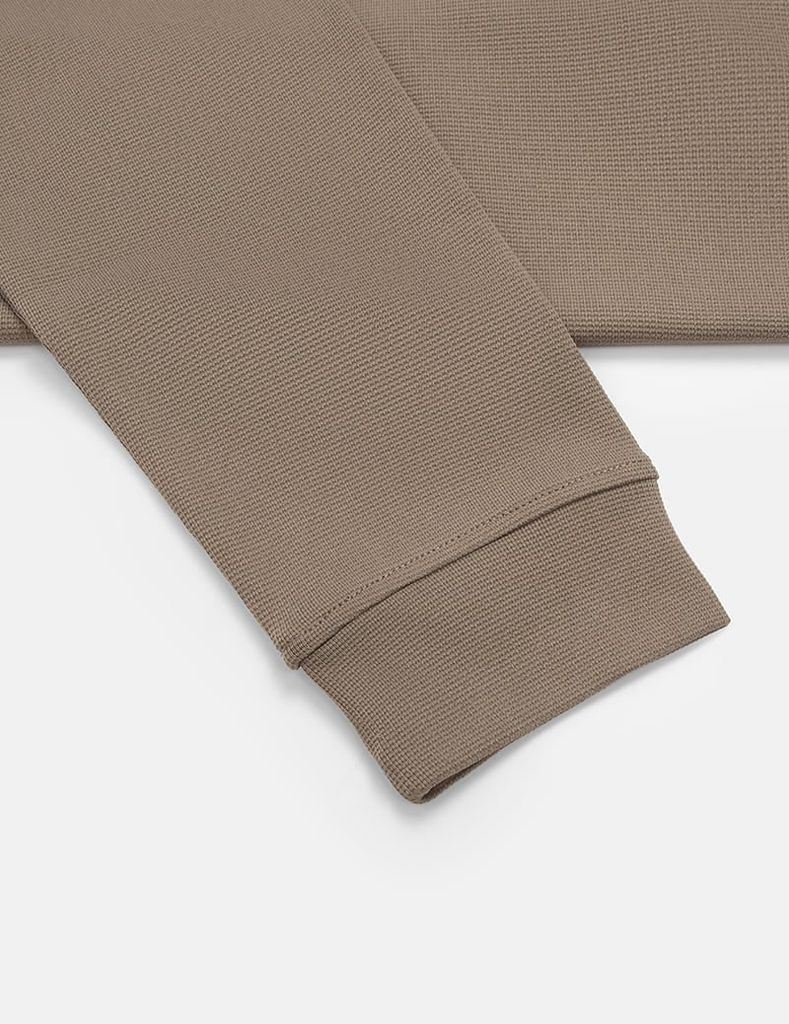 Áo nỉ nam cổ tròn mác cao su ngực