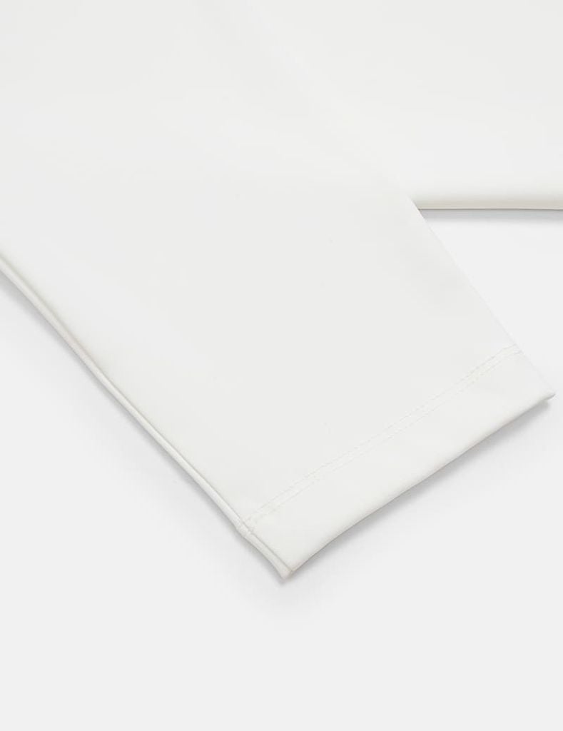 Áo giữ nhiệt nam cổ cao logo gấu áo