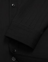 Áo sơ mi dài tay nam kẻ nhỏ tà lượn không túi