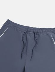 Quần gió nam cạp chun in cao su bên túi