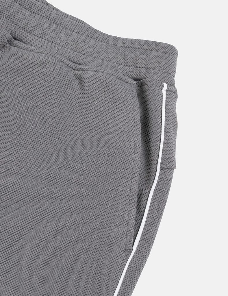 Quần nỉ nam bo gấu phối 2 bên sườn