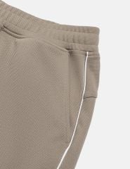 Quần nỉ nam bo gấu phối 2 bên sườn