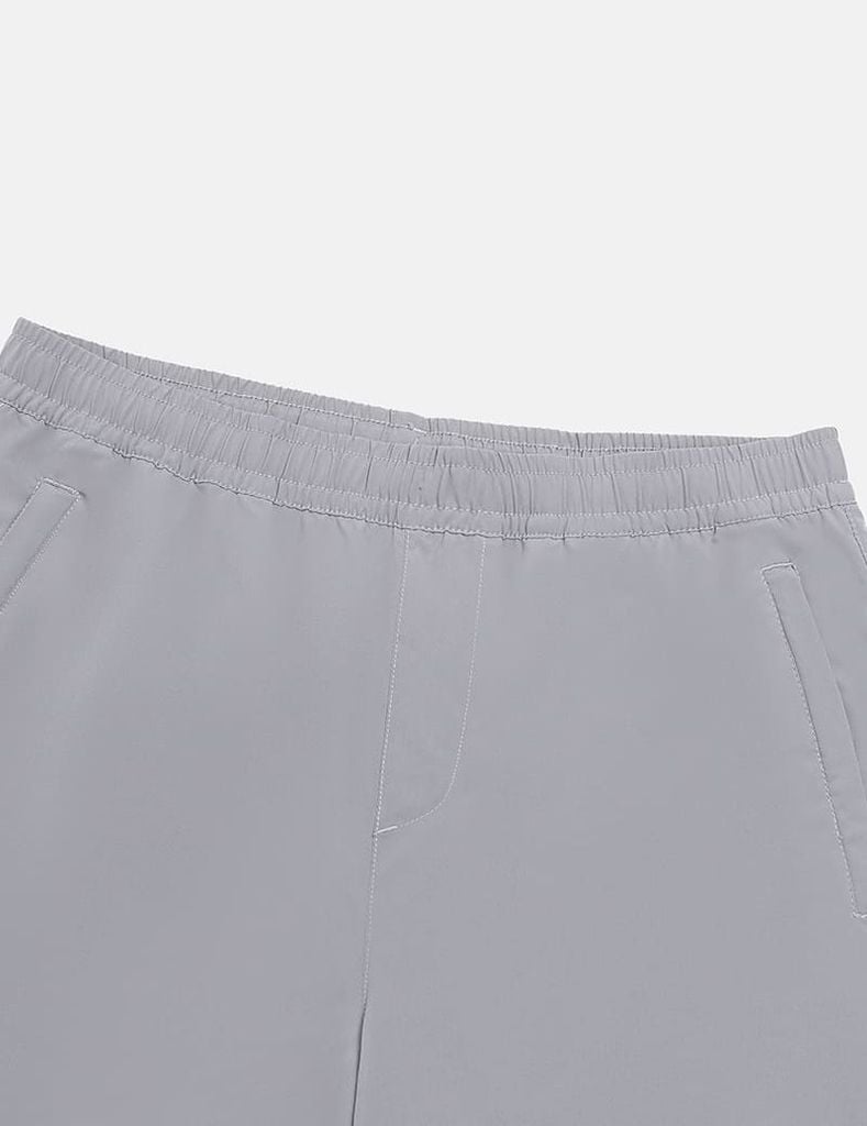 Quần short gió nam cạp chun in ống trái