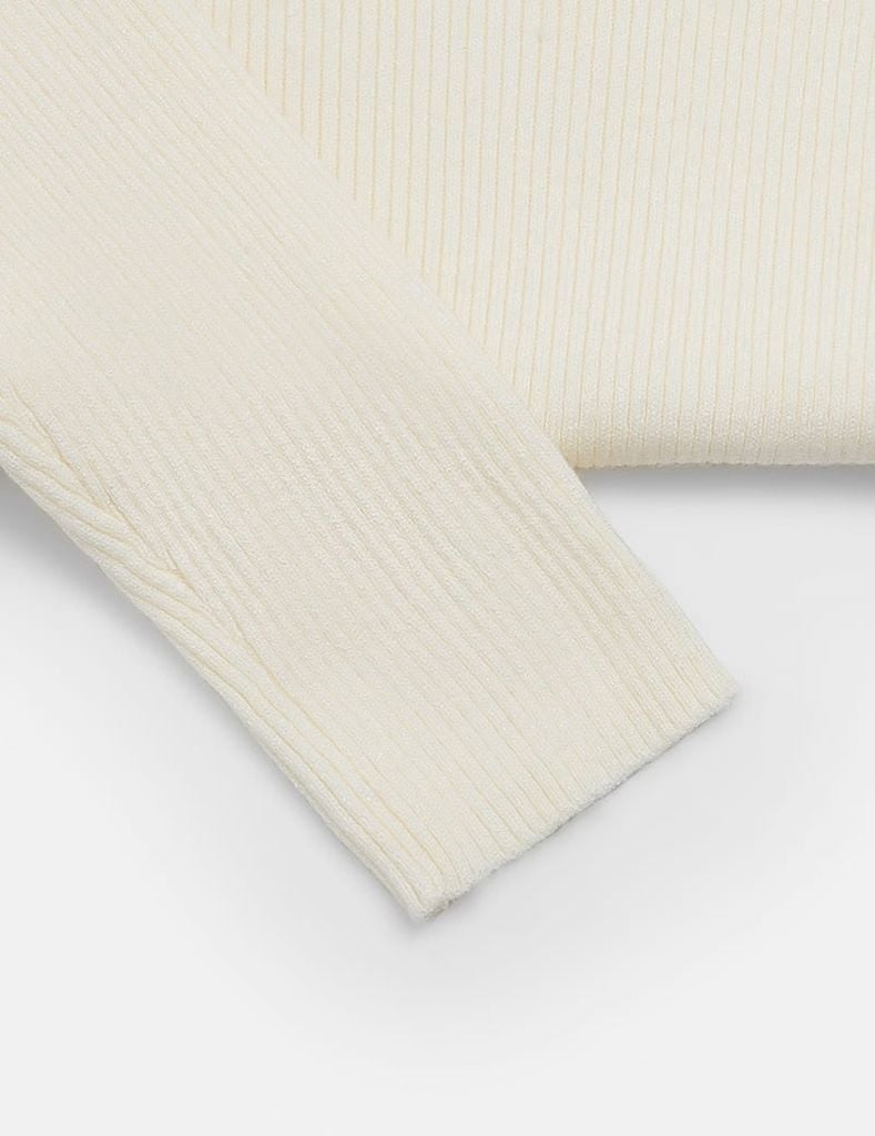 Áo len nữ cổ cao khoét chân cổ đính cúc