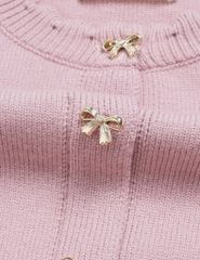 Áo len nữ cổ tròn khuy nơ kim loại